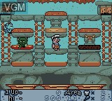 In-game screen of the game Flintstones, The - BurgerTime in Bedrock on Nintendo Game Boy Color