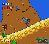 In-game screen of the game Desert Speedtrap - Starring Road Runner and Wile E. Coyote on Sega Game Gear