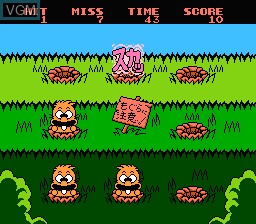 In-game screen of the game Super Mogura Tataki!! Pokkun Mogura on Nintendo NES