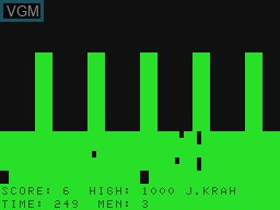 In-game screen of the game Frogger on Tandy MC10